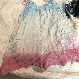 Bathing suit coverup from justice size 18 plus, normal size  it’s like a small